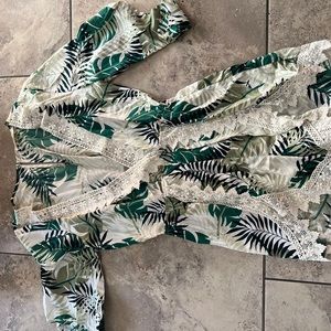 Brand new tropical romper with lace